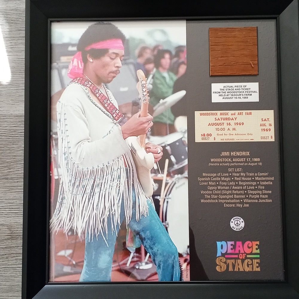 Jimi Hendrix portrait with actual pieces of the stage and ticket